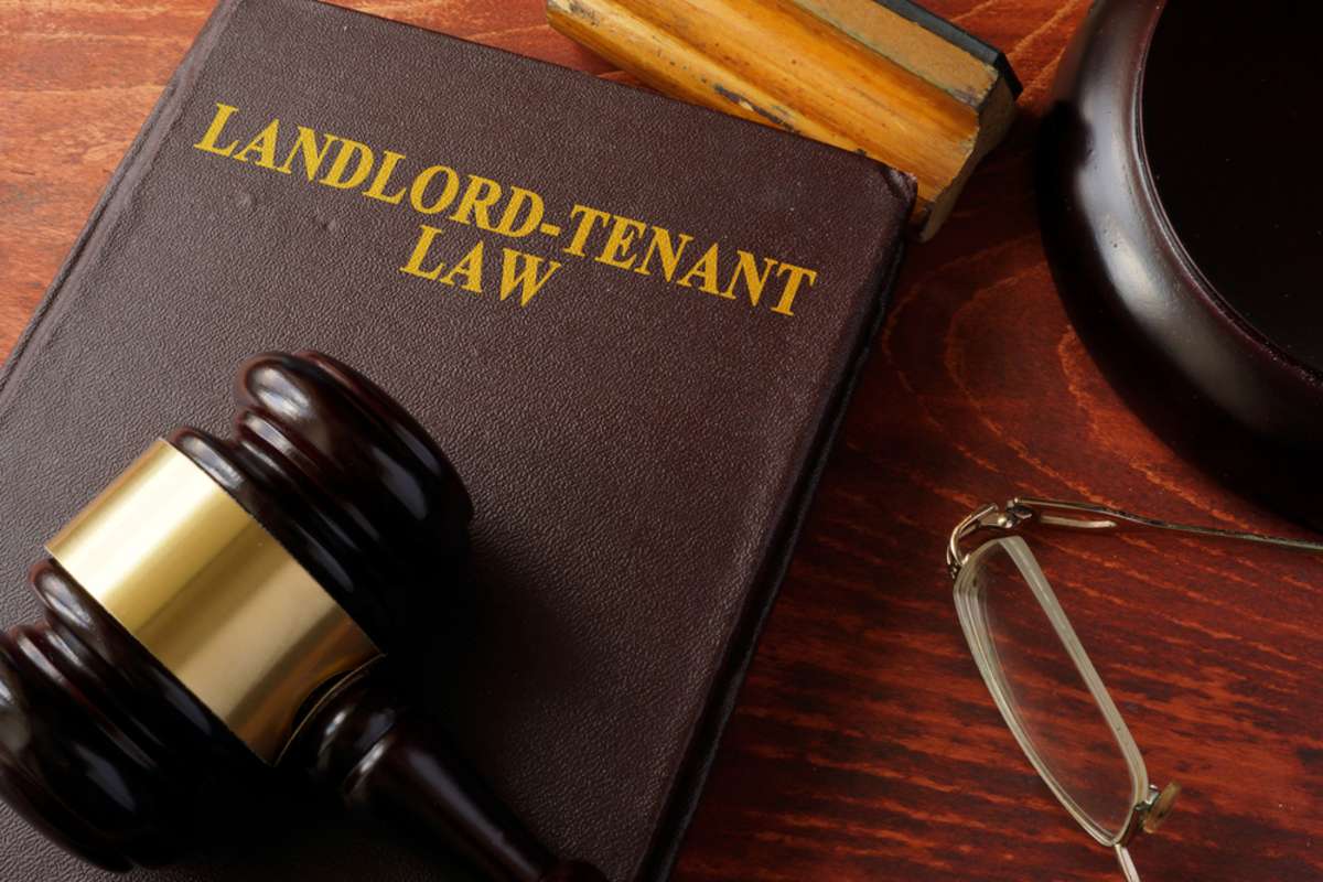 Book with title Landlord-Tenant Law and a gavel