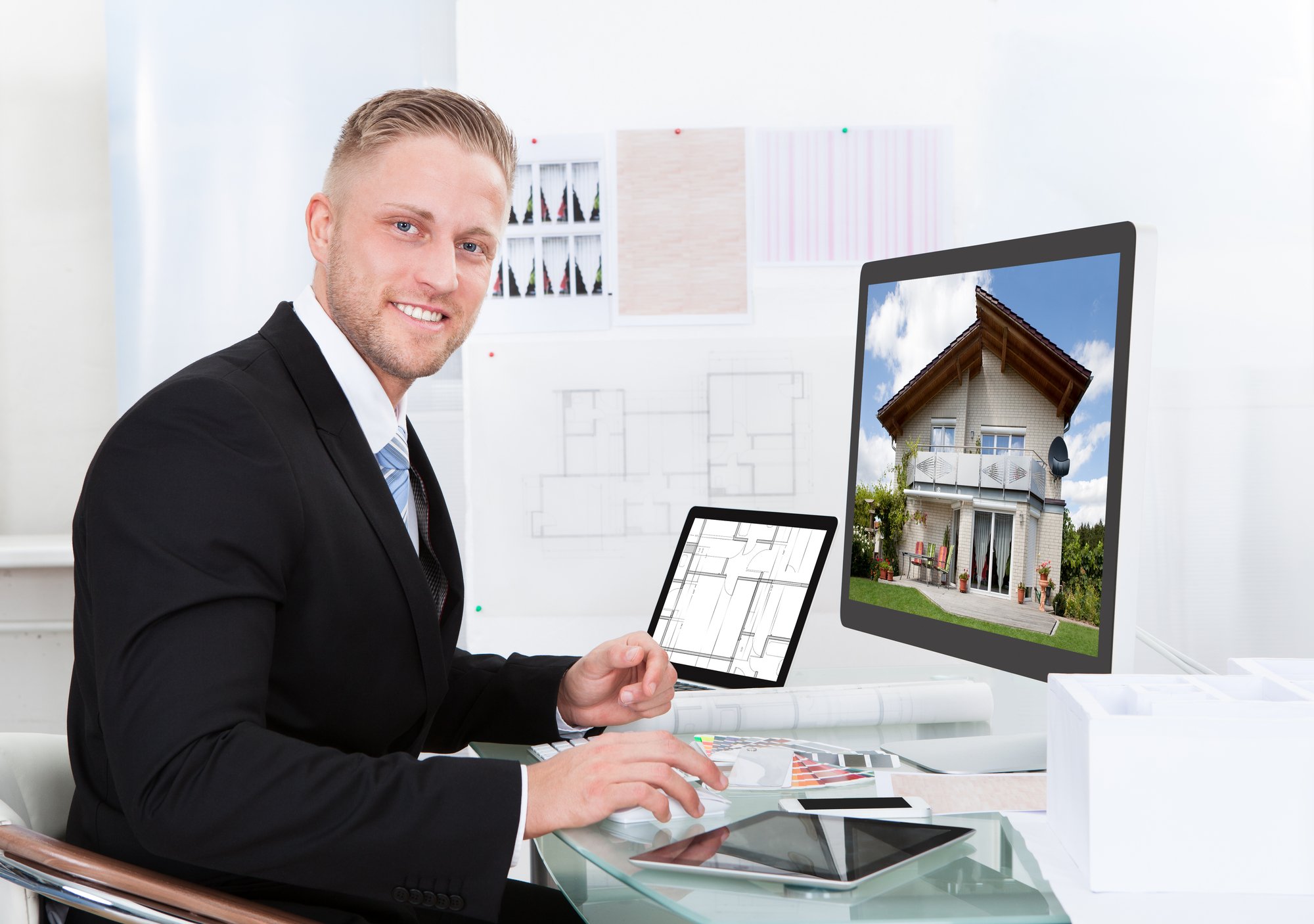 Businessman checking a property portfolio online