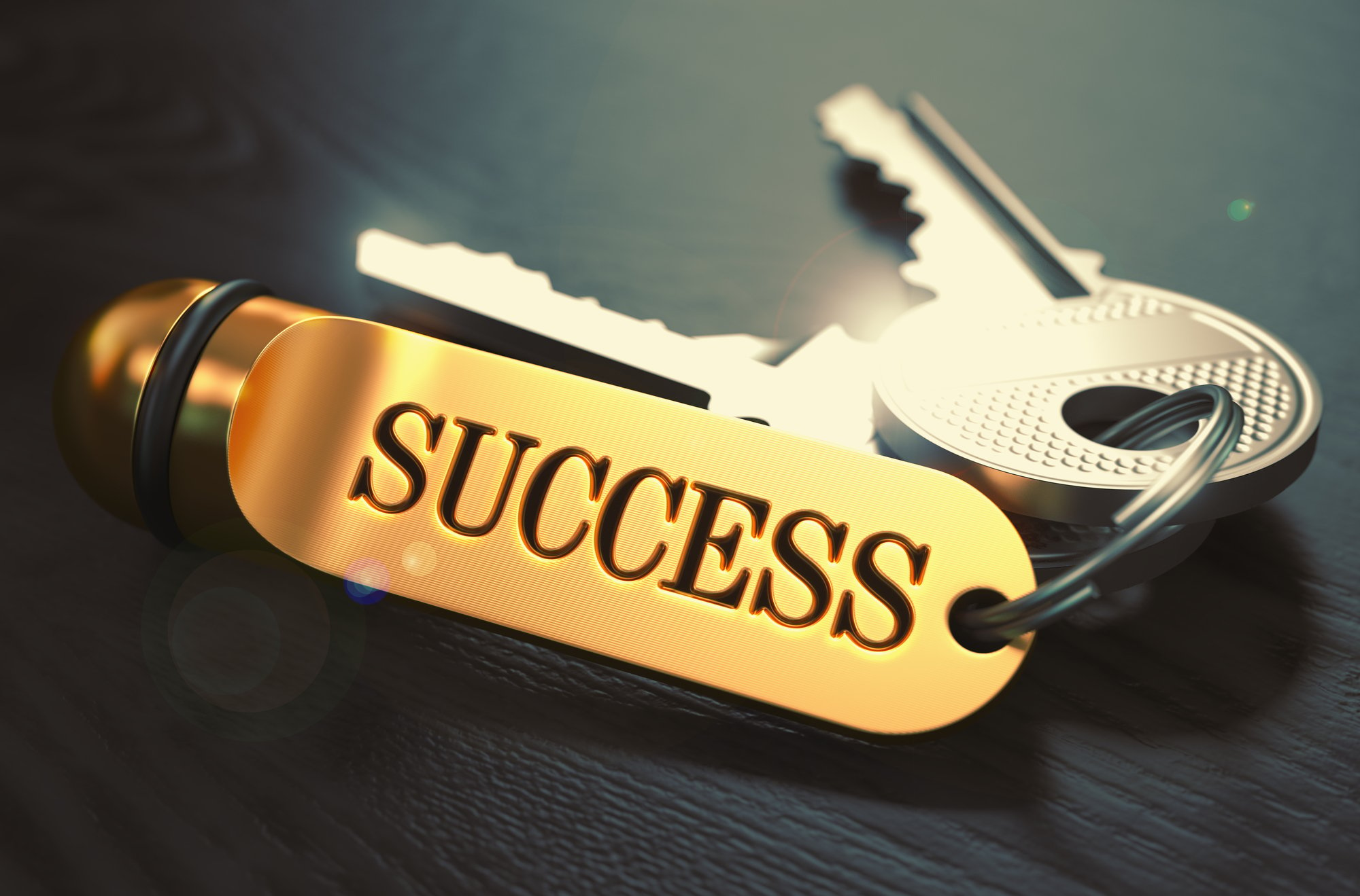 Keys to Success. Concept on Golden Keychain