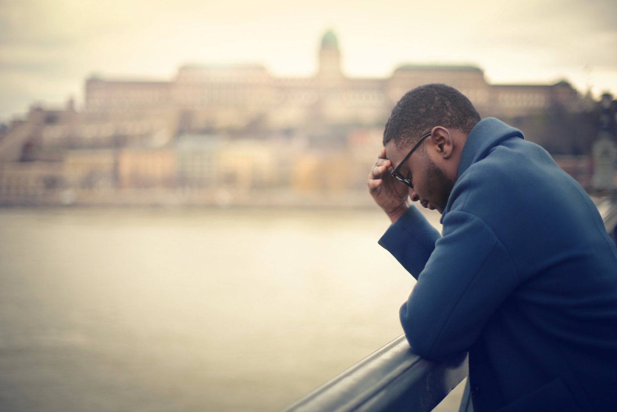Worried businessman in a bridge